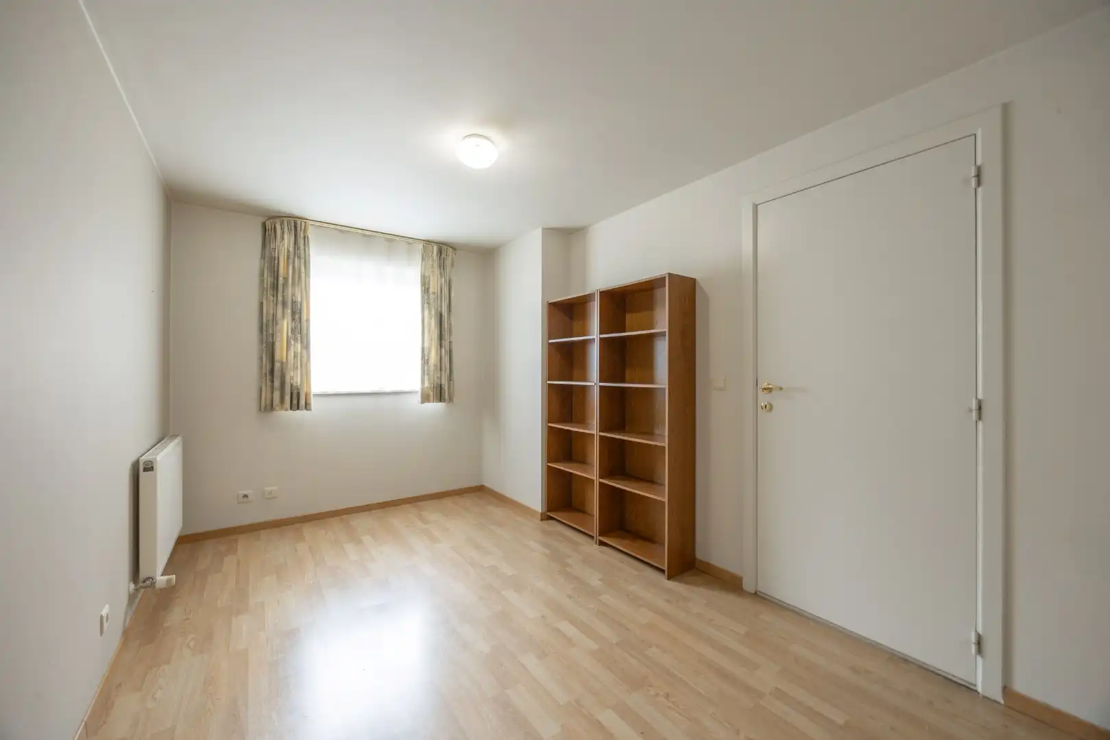 Ruim gelijkvloers appartement met terras en 2 slaapkamers te Overpelt centrum. foto 19