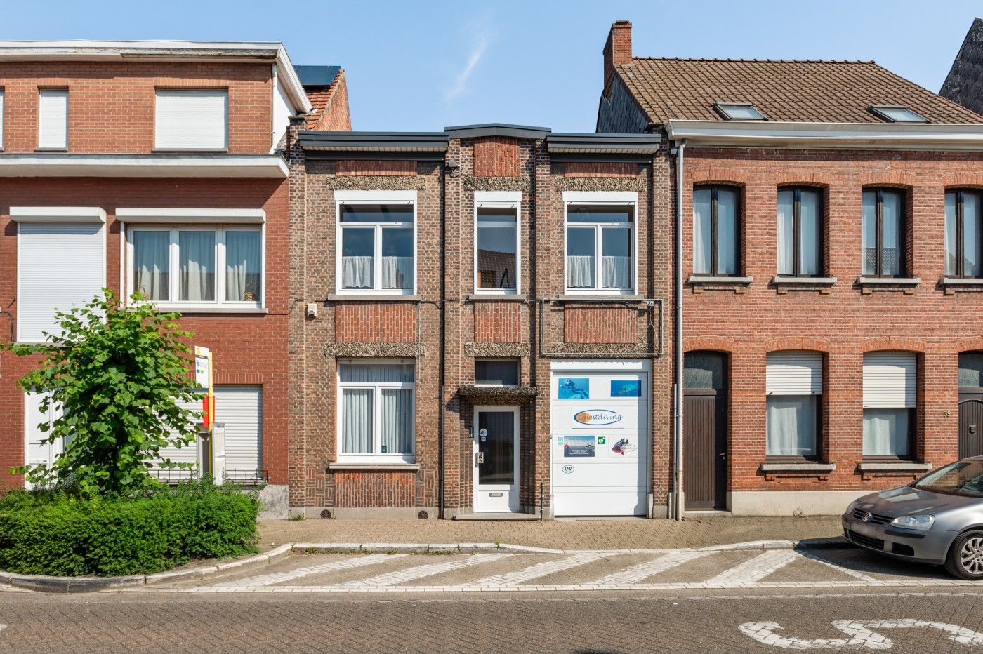 Prima onderhouden woning met 4 slpk., inpandige garage, achterliggend atelier en tuin foto 1