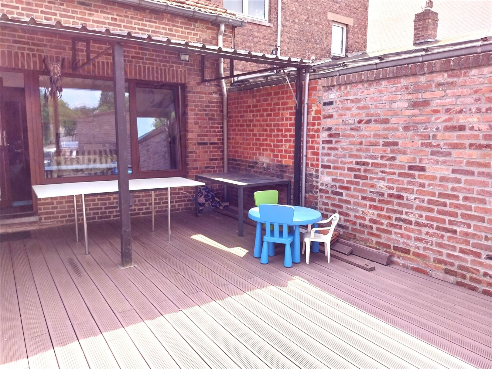 TE HUUR: Woning met 2 slaapkamers en tuintje in Genk! foto 15