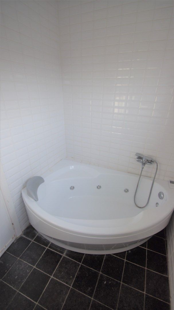 Mooi gelegen woning met tuin/terras, 2 slpks en garage foto 10