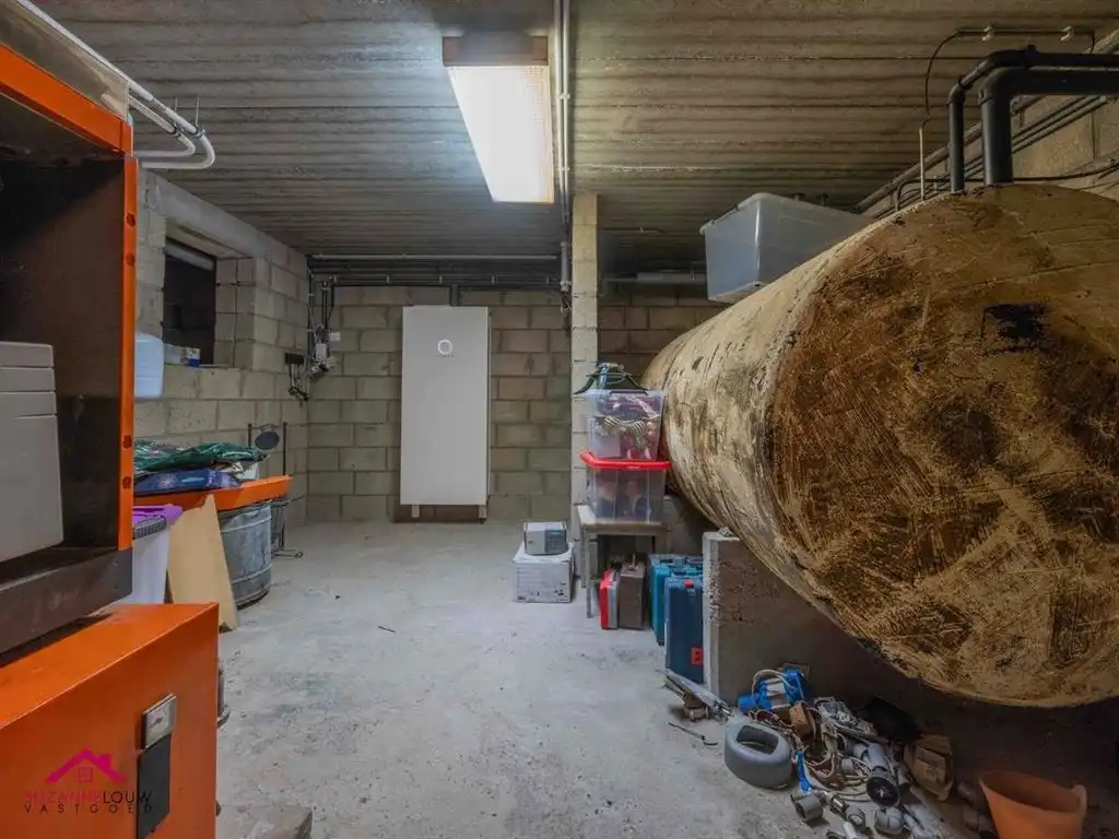 Charmante vrijstaande woning met sfeervol aangelegd terras foto 50