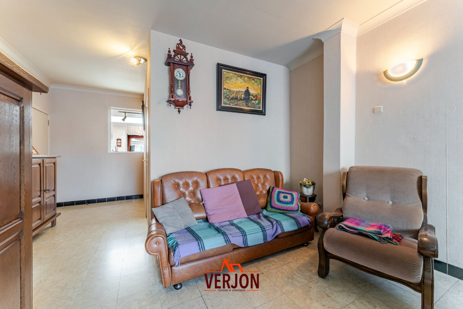 Charmante woning met ruime tuin te koop op het dorpsplein in Kachtem! foto 4