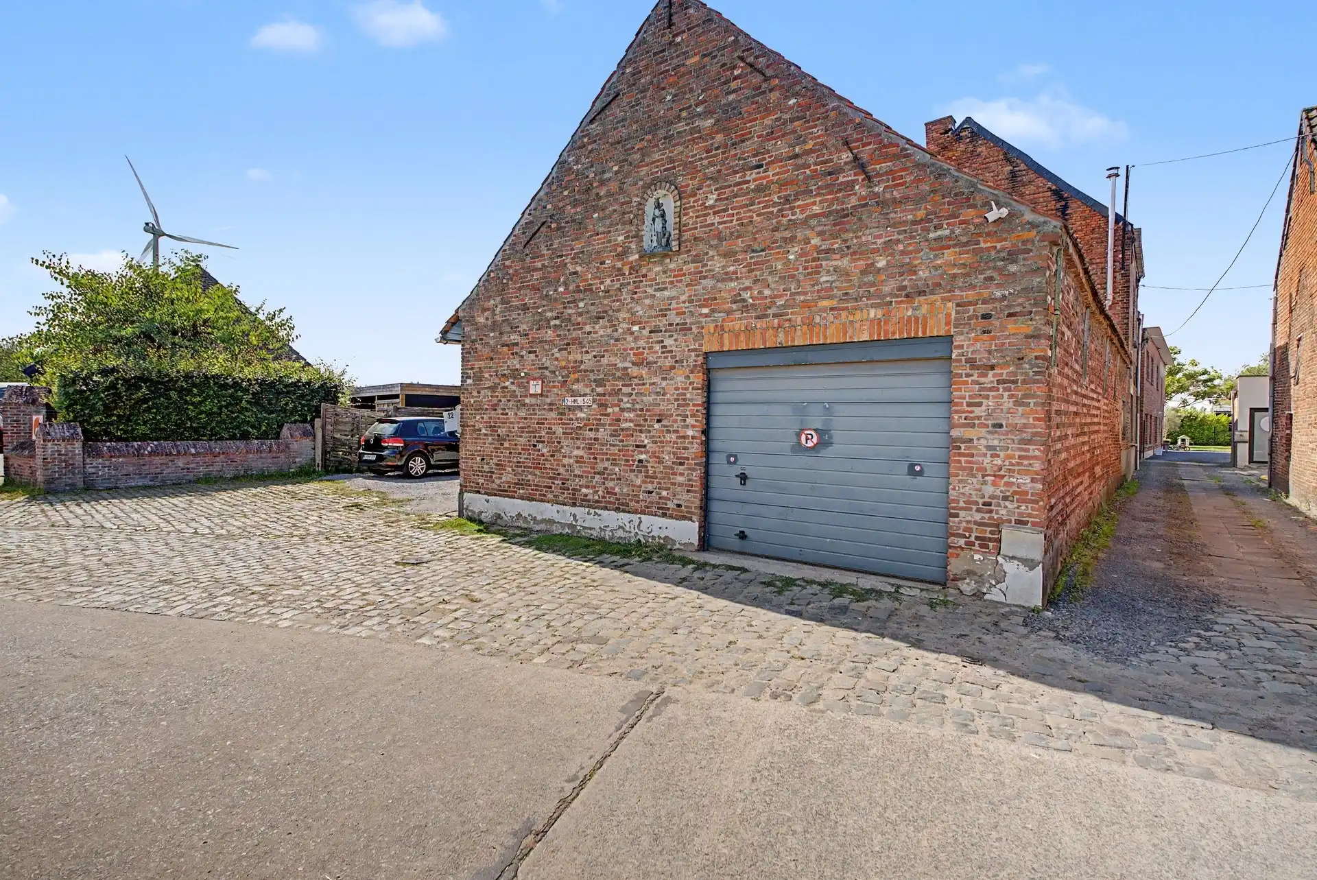 Heel ruime woning, met open zicht en grote garage/magazijn (82m²) op een perceel van 760m², te Grembergen foto 22