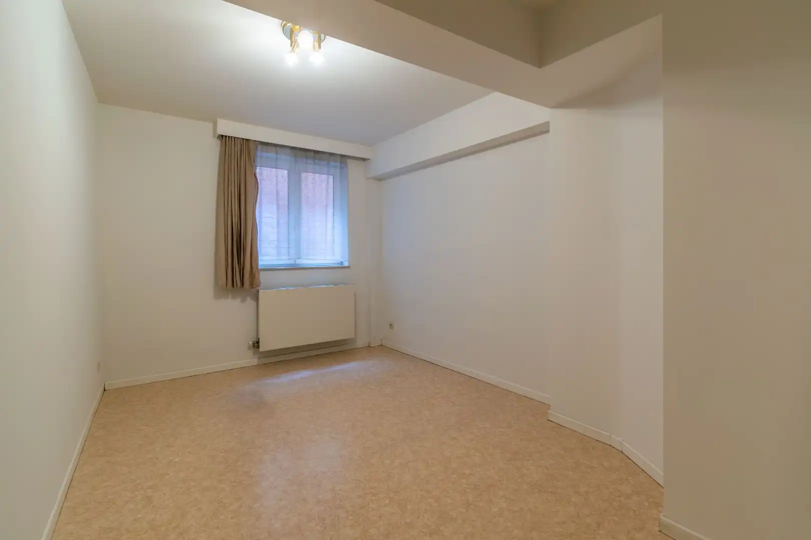 RUIM APPARTEMENT MET 2 SLAAPKAMERS + GARAGEBOX ! foto 10