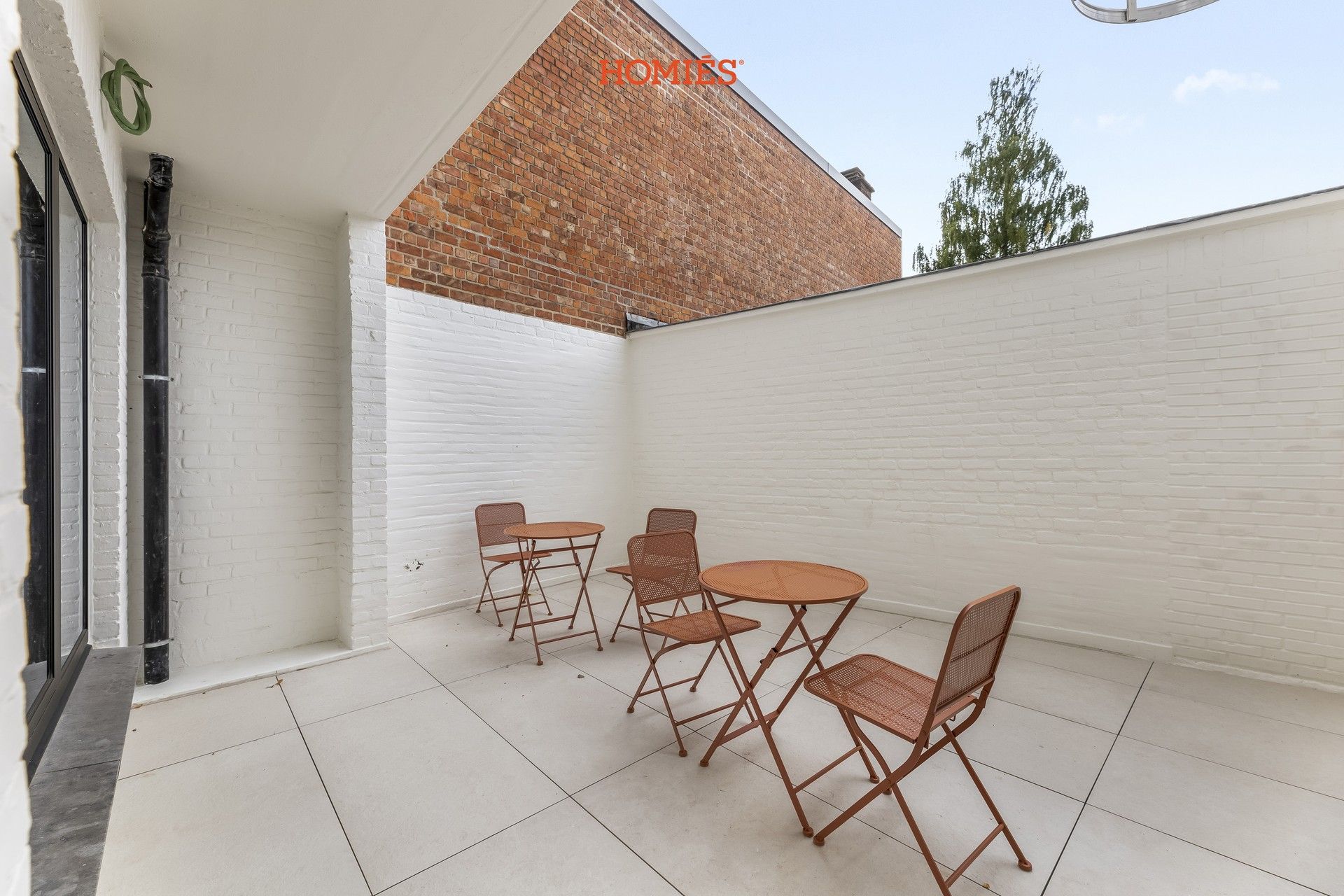 Luxueus en energiezuinig gelijkvloersappartement met stadskoer foto 8