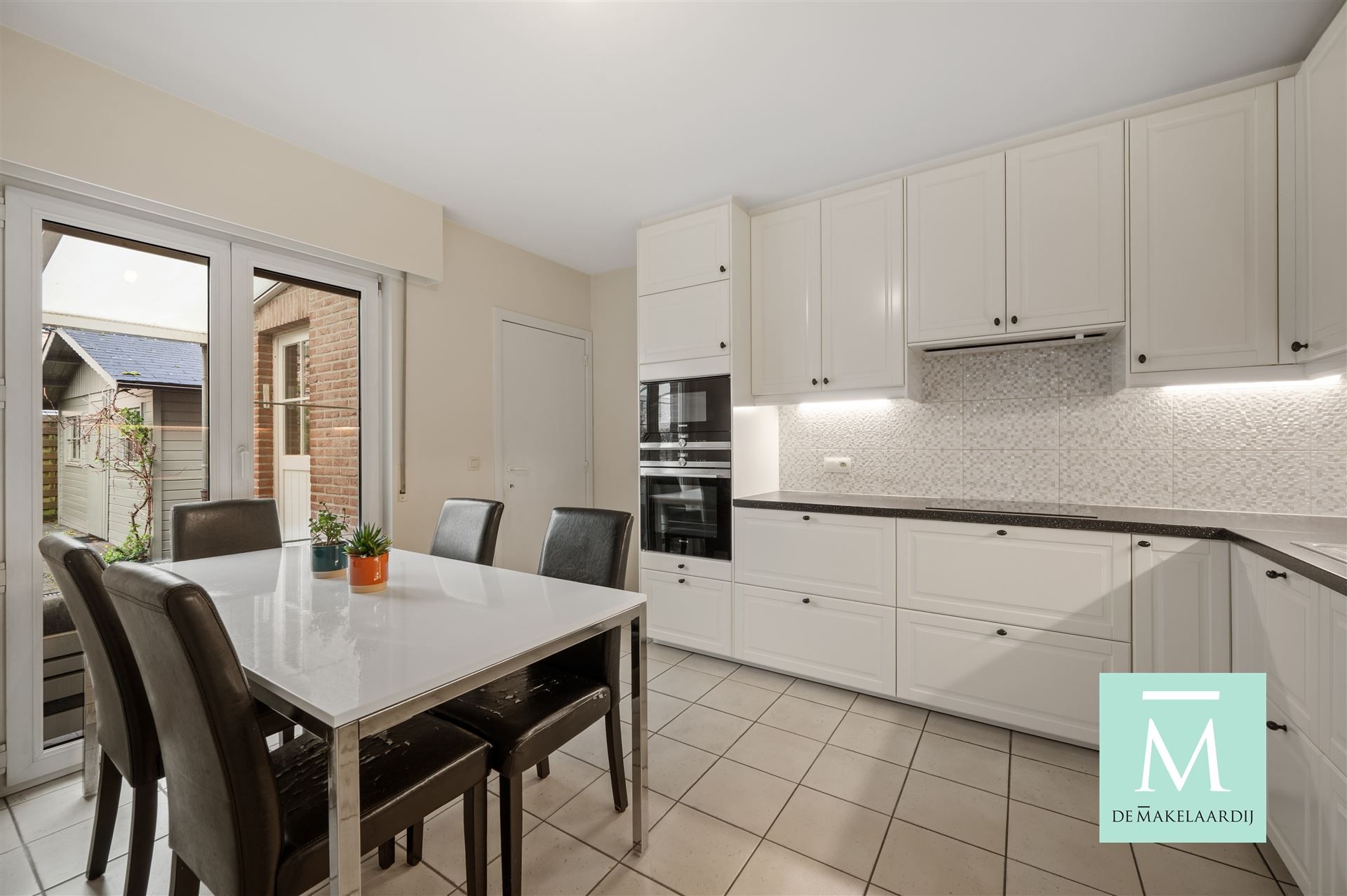 Ruime gezinswoning met zonnige tuin te huur in het rustige Sint-Katelijne-Waver! foto 6