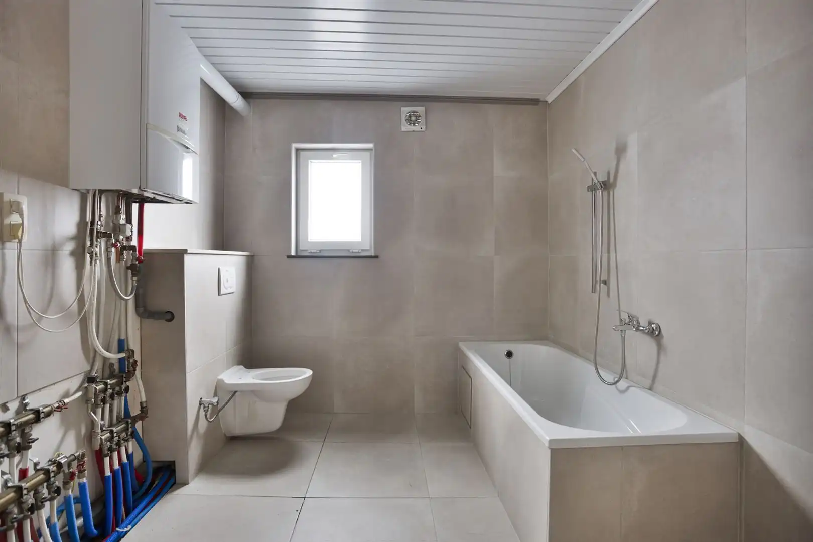 TE KOOP: Opbrengsteigendom in het centrum van Heusden-Zolder! foto 25