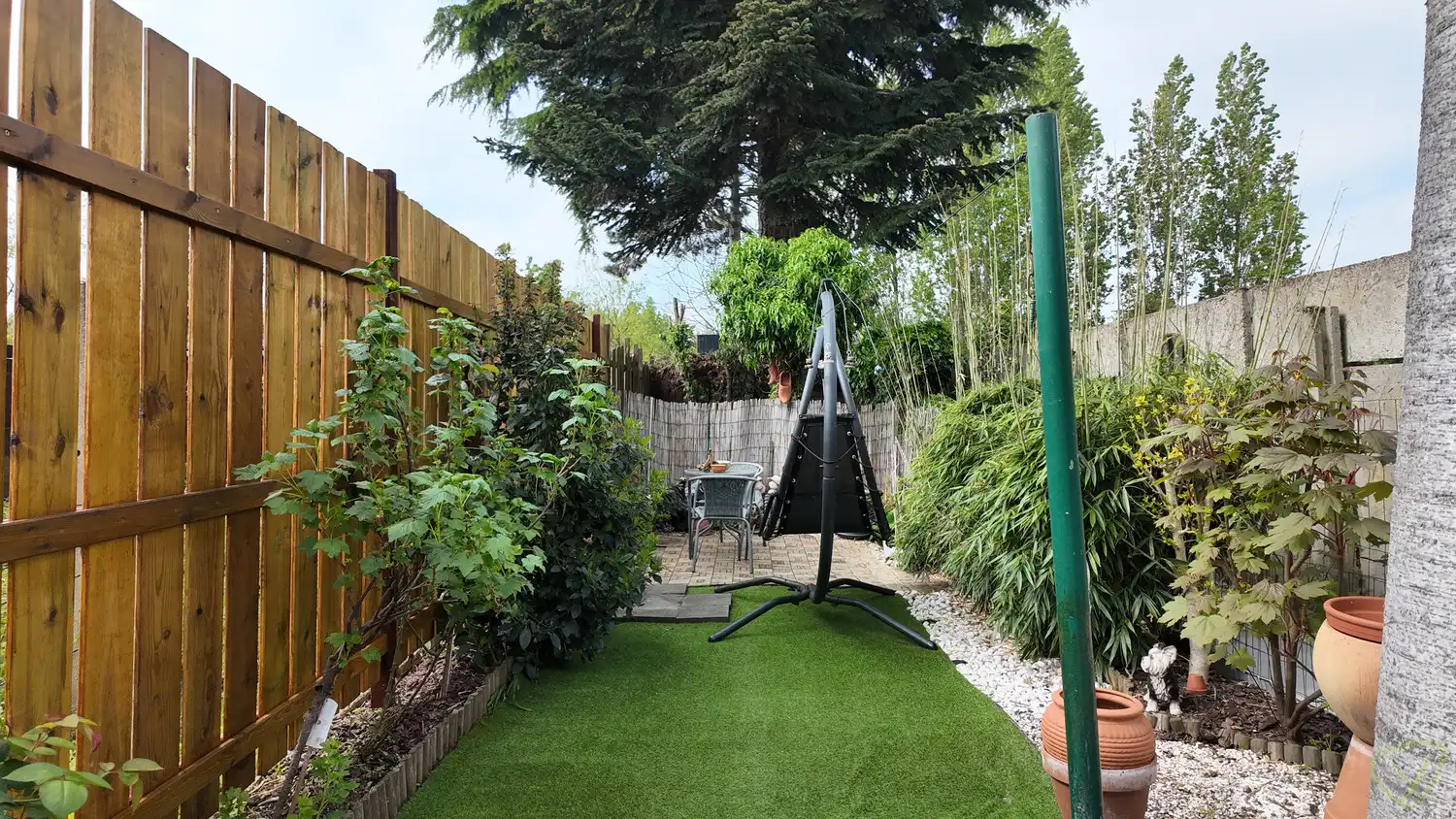 Charmante gesloten bebouwing met ruime tuin en renovatiepotentieel foto 20