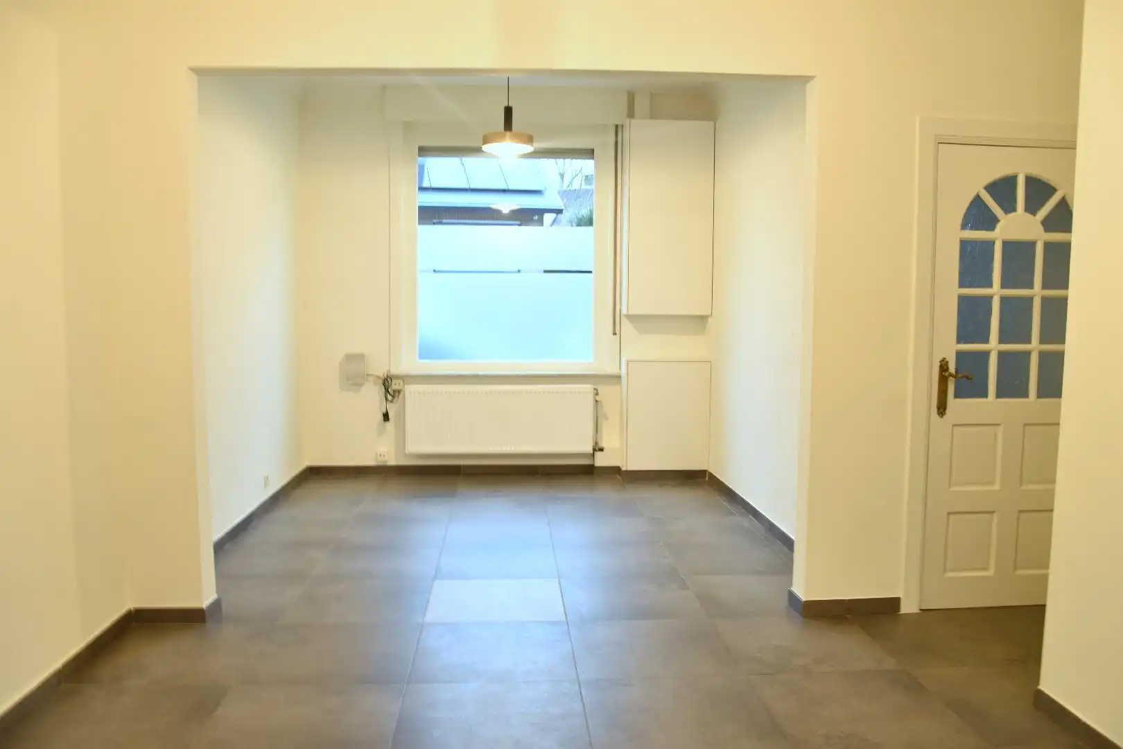 Vernieuwde rijwoning met 3 slaapkamers en een mooi stukje tuin te koop in Bellegem foto 3