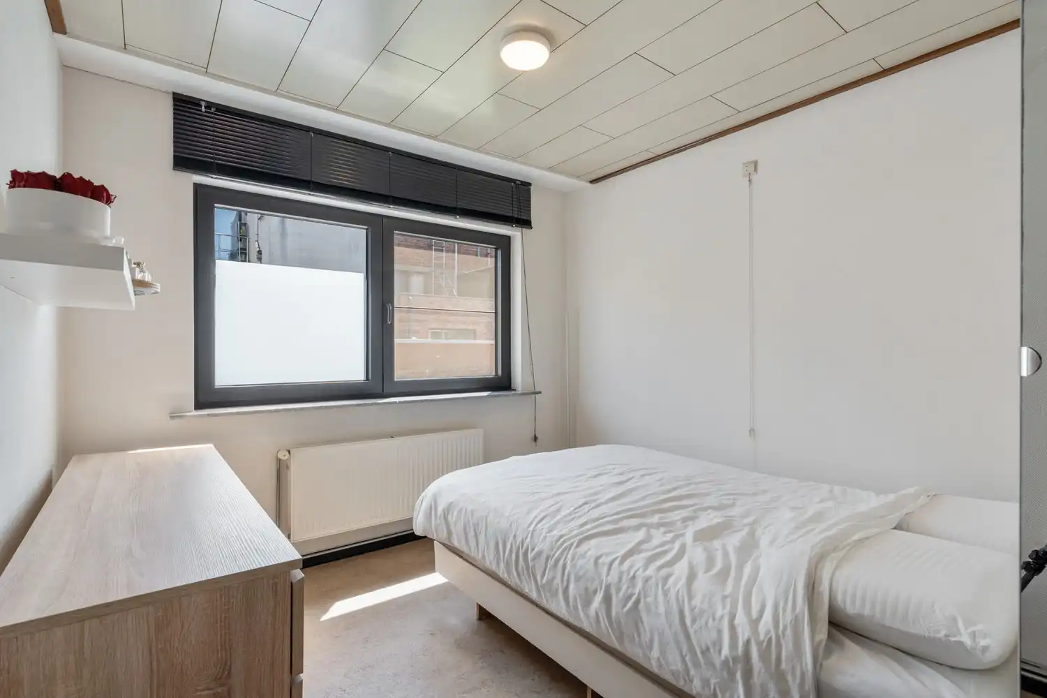 Rustig gelegen woning met 2 slaapkamers en een koer nabij het station te centrum Leuven! foto 13