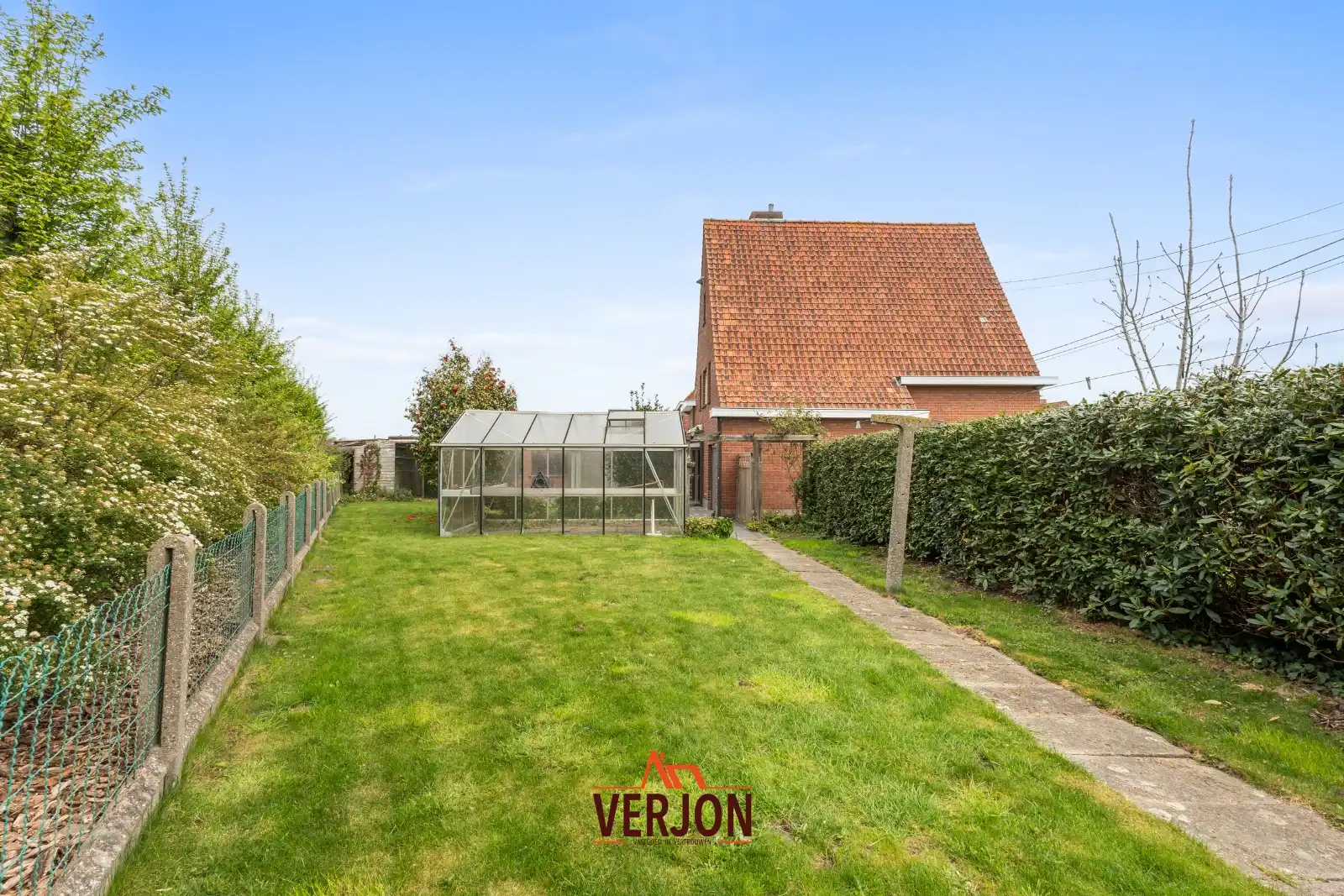 Ruime gezinswoning met 4 slaapkamers, grote garage en zonnige tuin foto 18