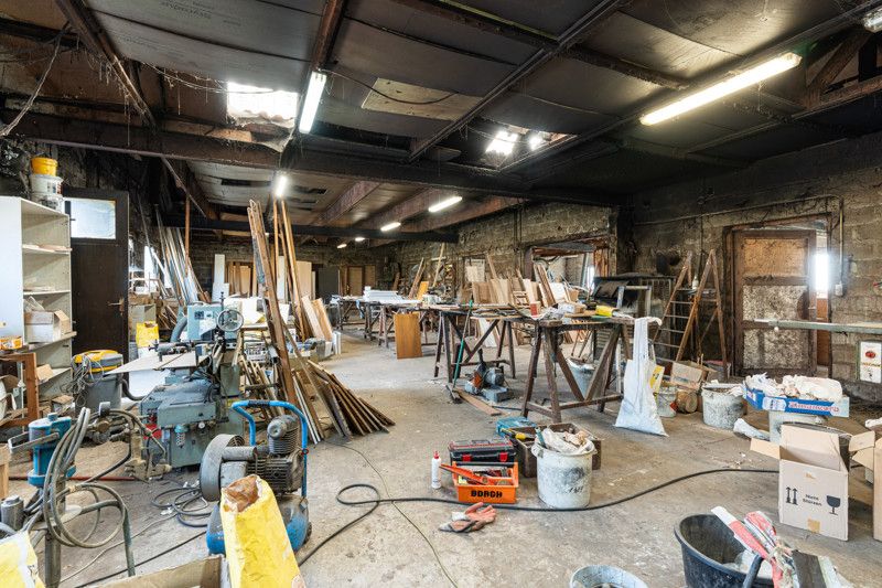 Gelijkvloerse woning met grote loods achteraan op 25are foto 40