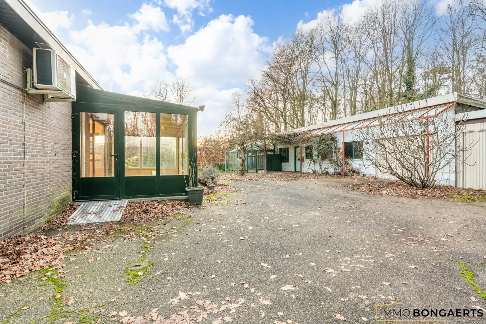Gelijkvloerse woning met polyvalent bijgebouw foto 23