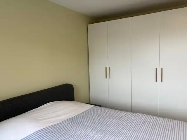 Ongemeubeld tweeslaapkamer-appartement in moderne residentie in Mariakerke foto 19