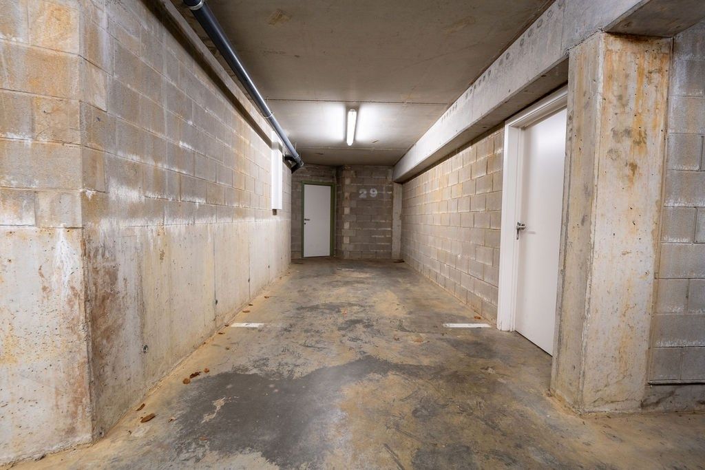 GUNSTIG GELEGEN 2 SLAAPKAMER APPARTEMENT 94 M² MET ONDERGRONDSE AUTOSTANDPLAATS EN KELDERBERGING IN HET CENTRUM VAN ZOLDER foto 22