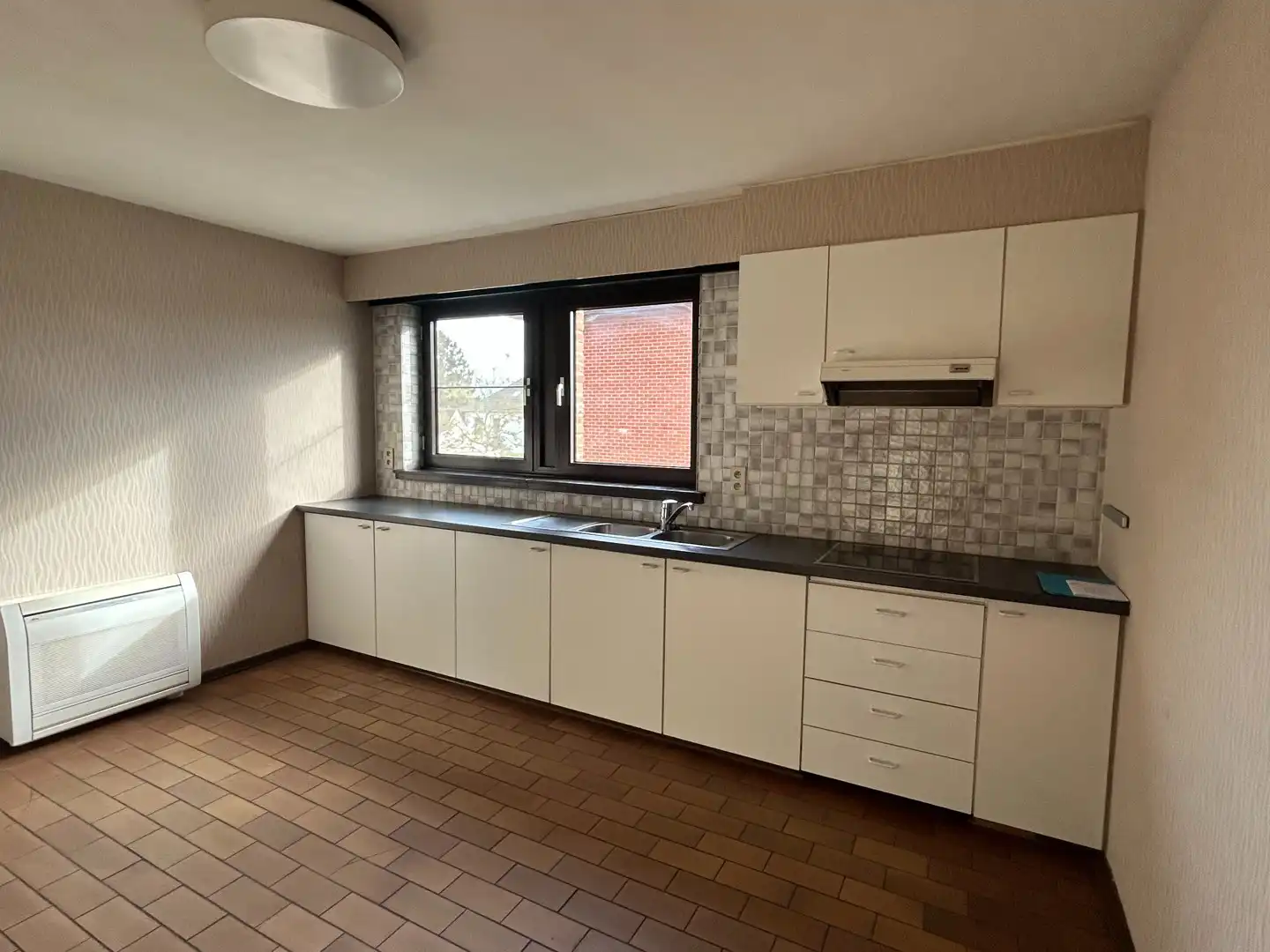 Appartement met 2 slpkmrs met terras en tuin in centrum Oevel te huur! foto 10