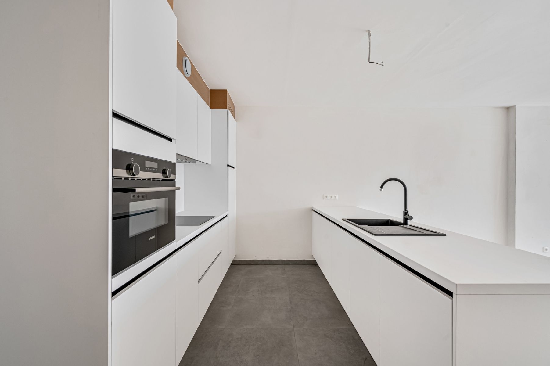 Gelijkvloers appartement met terras en tuin foto 4