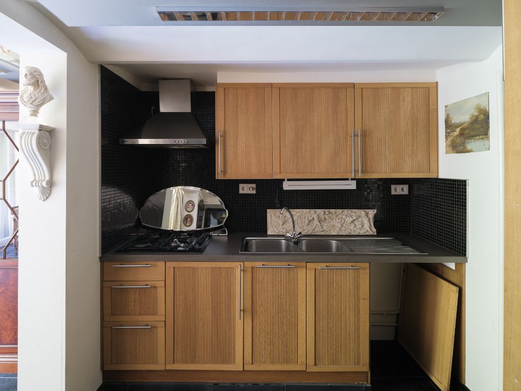 Karaktervolle burgerwoning met drie slaapkamers en een aangename, groene tuin op een uitstekende locatie in Gent. foto 25