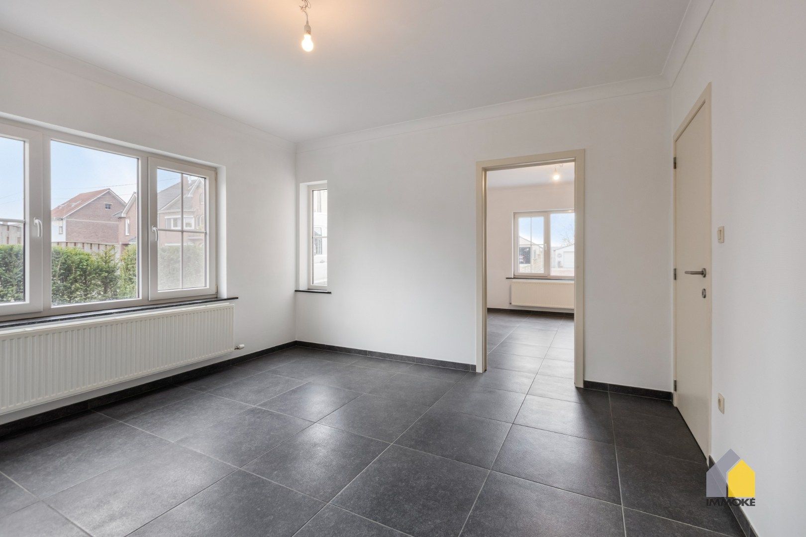 Energiezuinige woning op 3 a 14 ca met 3 slpk, 2 badkamers en knusse tuin. foto 11