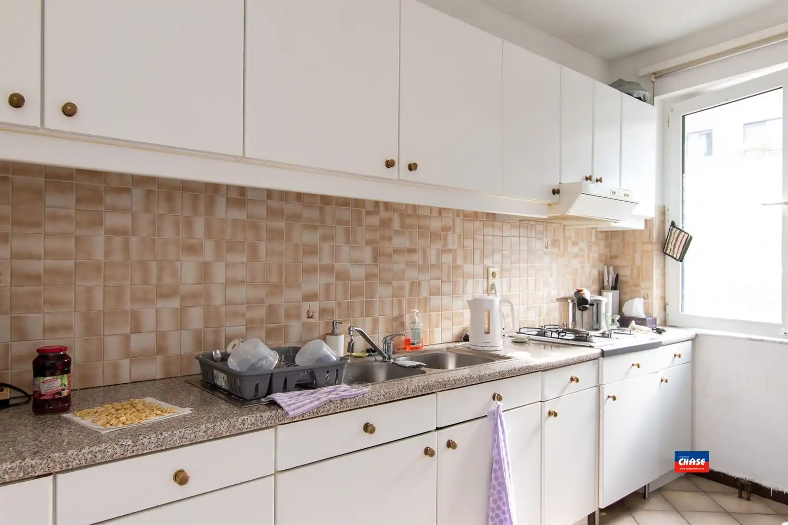 Gelijkvloersappartement met 2 slpks, tuin + garage foto 5