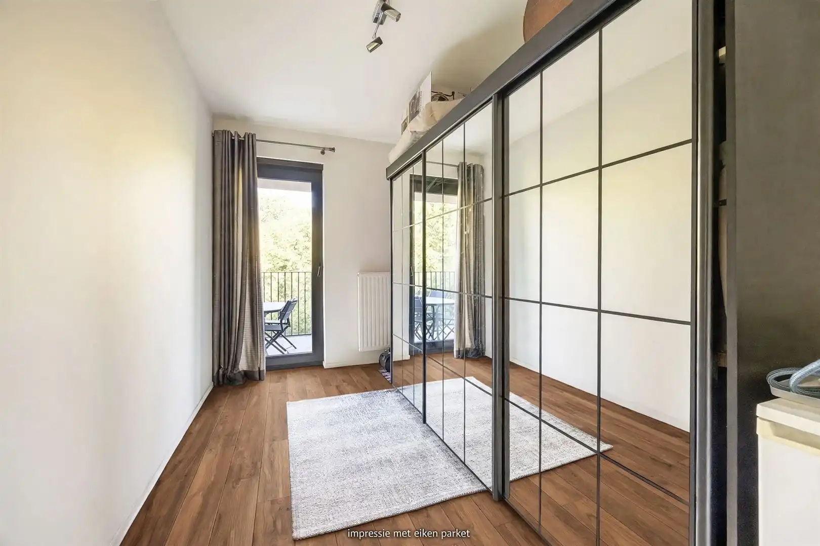 Lichtrijk appartement met groenzicht, parking en groot terras foto 13