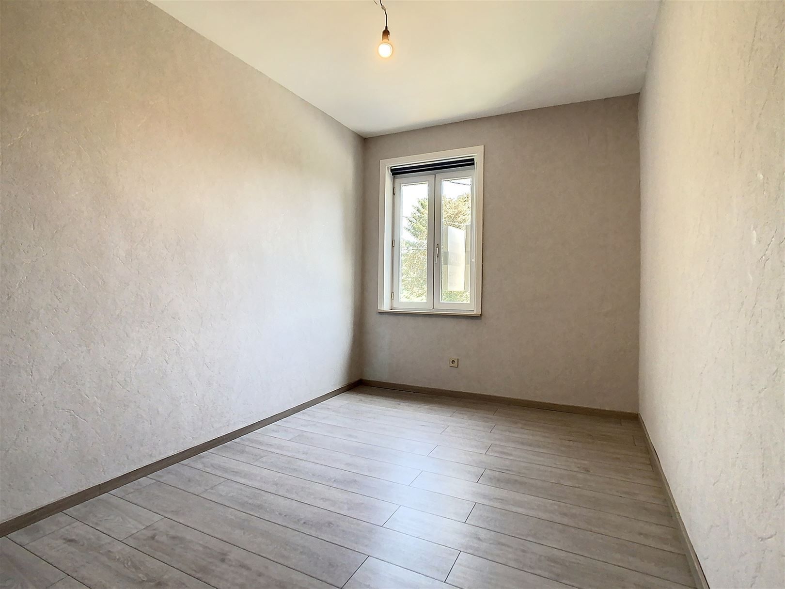 Instapklare woning, 2 slpks, tuin en garage foto 40