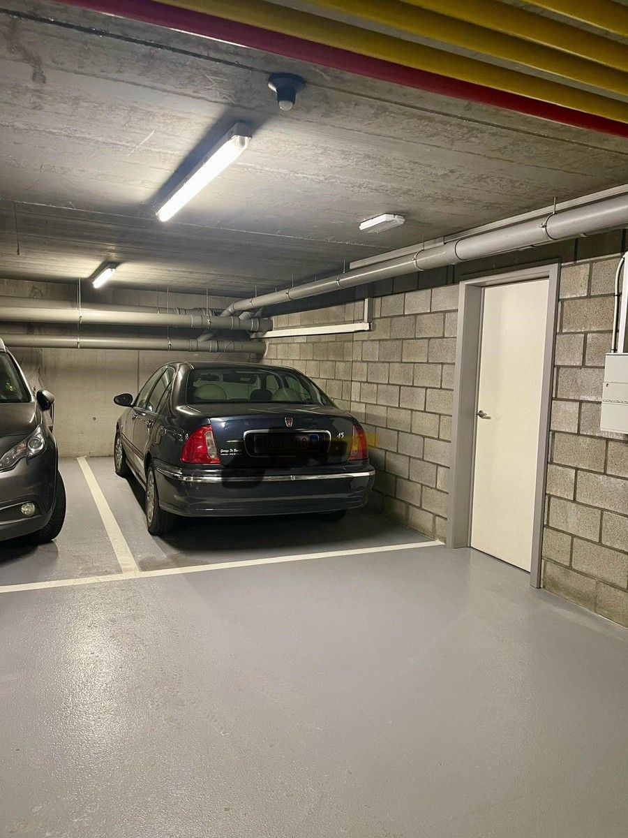Gelijkvloers appartement met tuin, binnenautostaanplaats en kelder foto 13