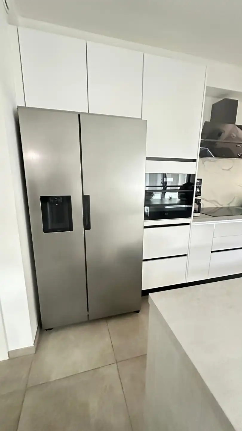 Modern nieuwbouwappartement met terras te huur foto 10