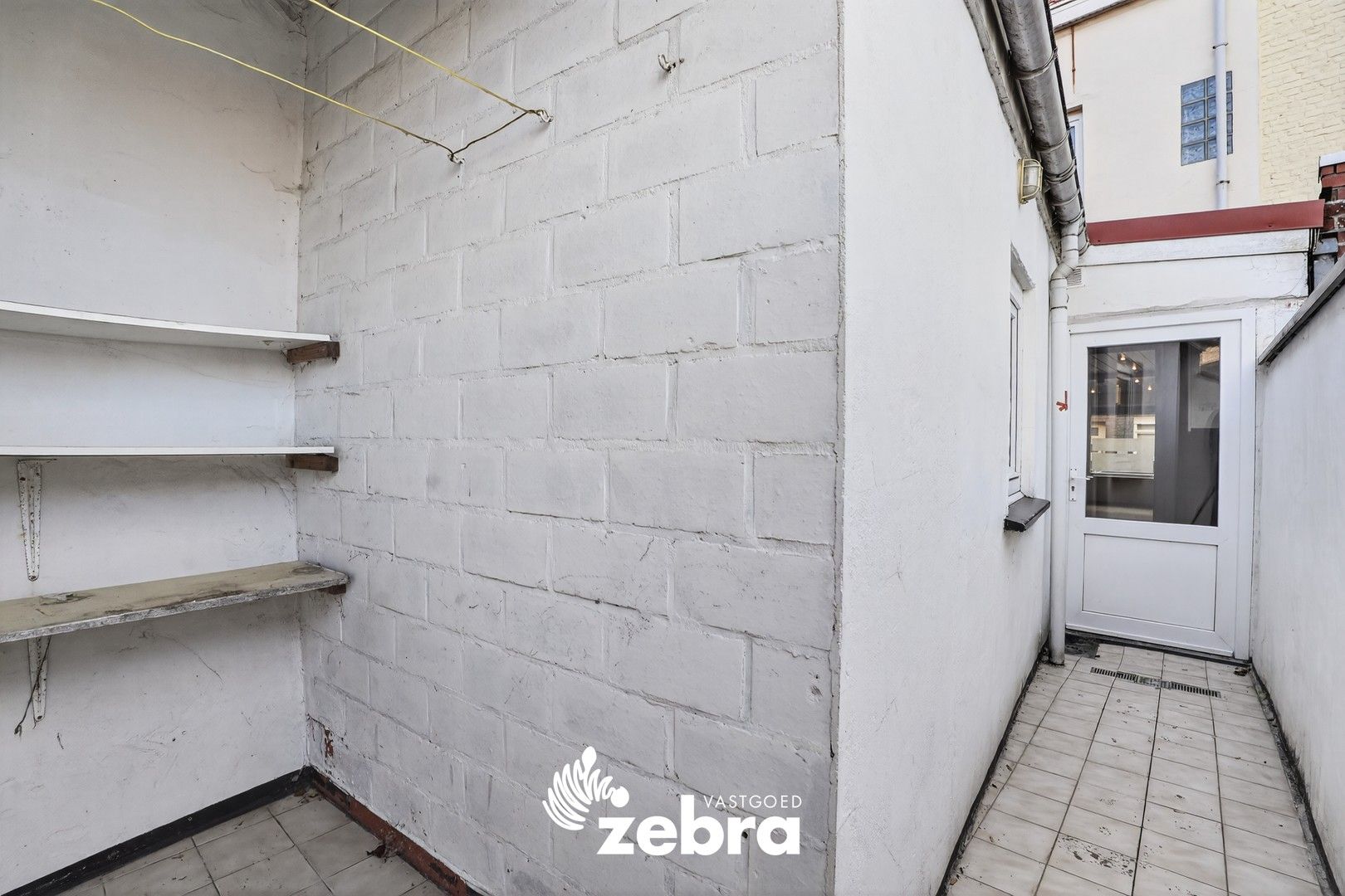 Stadswoning met twee slaapkamers en koer in centrum Tielt! foto 20