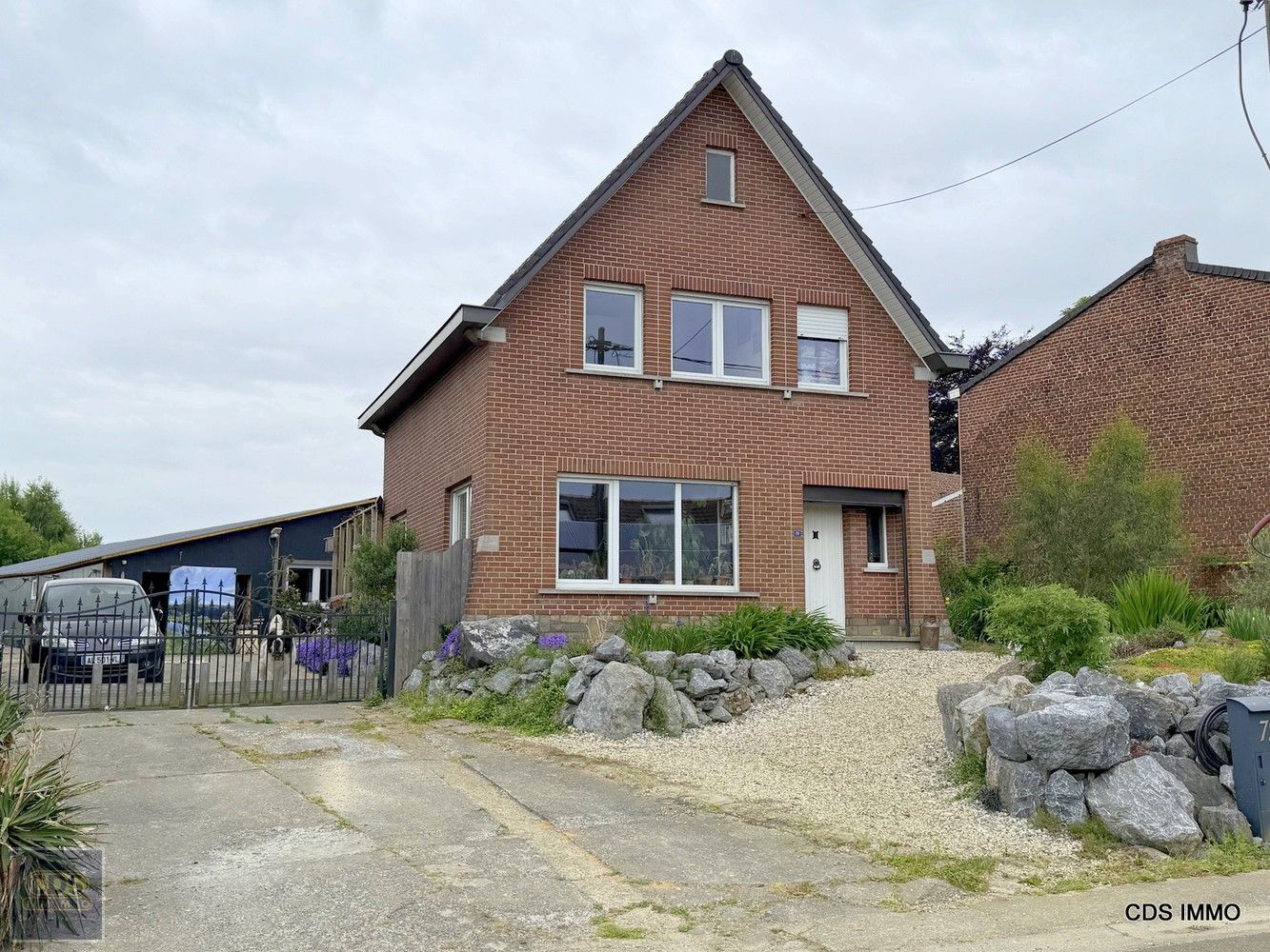 Woning met magazijn foto 2