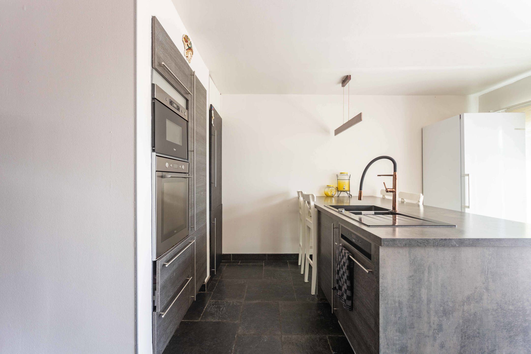 Instapklare & ruime woning op een toffe locatie foto 11
