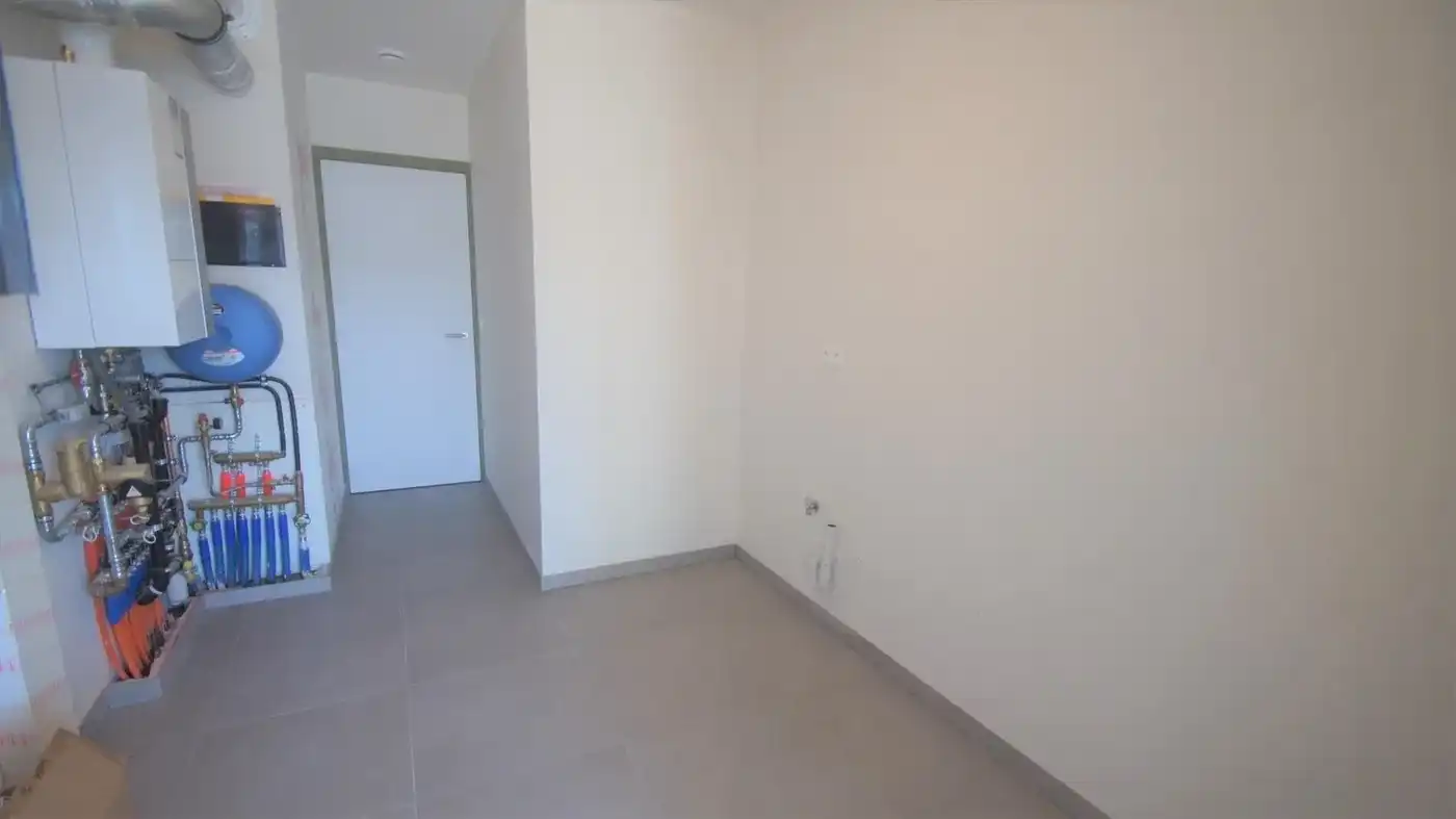 Nieuwbouwapp. met 2 slpks, autostaanplaats, ruim terras en tuintje foto 10