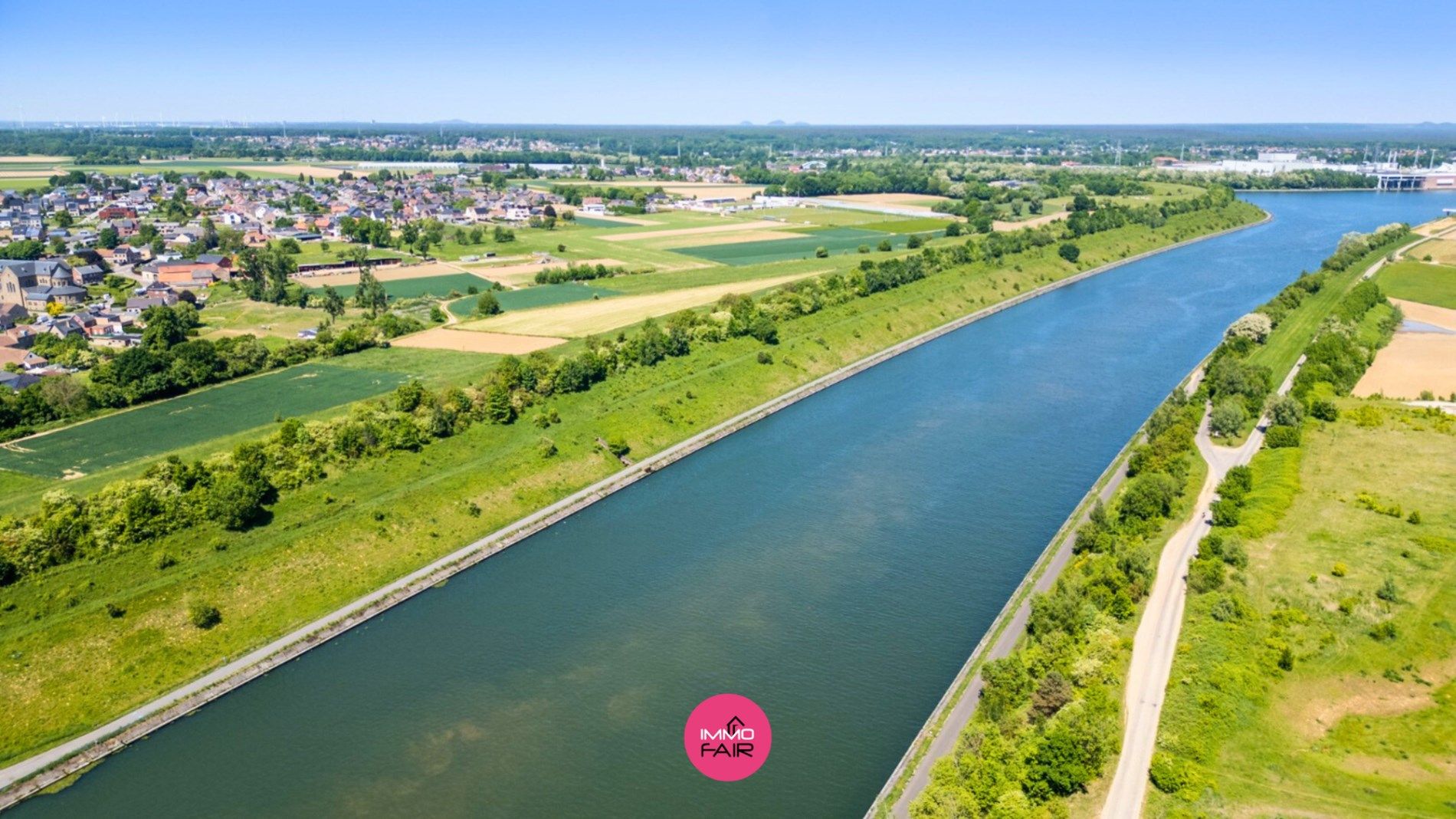 Bouwgrond met losstaand weiland in Veldwezelt op unieke locatie vlakbij Maastricht! foto 4