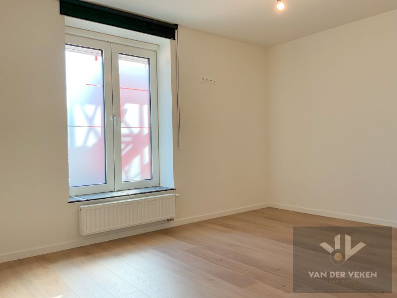 Mooi gelijkvloers 1 slaapkamer appartement foto 9