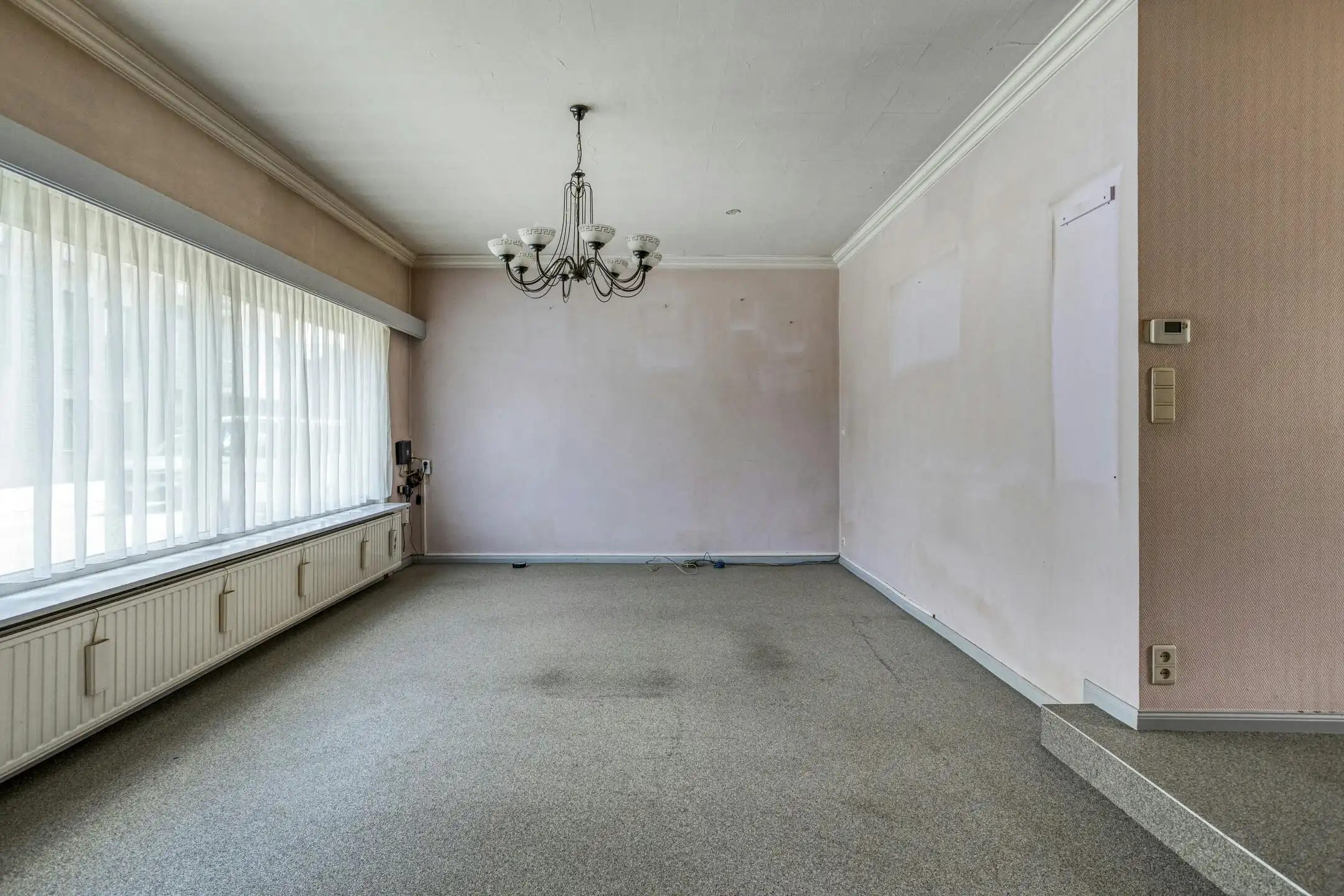 Te renoveren huis met vier slaapkamers en tuin in Kruibeke foto 3