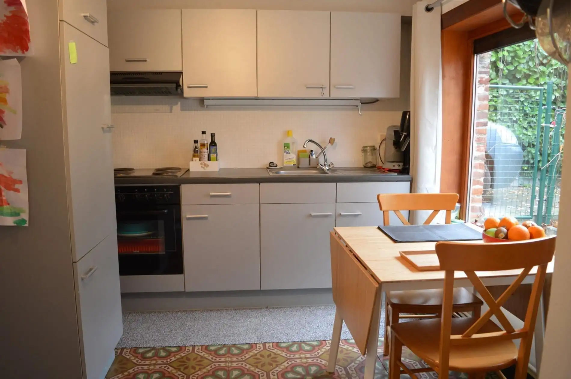Knusse halfopen bebouwing met 1 zeer ruime slaapkamer foto 6