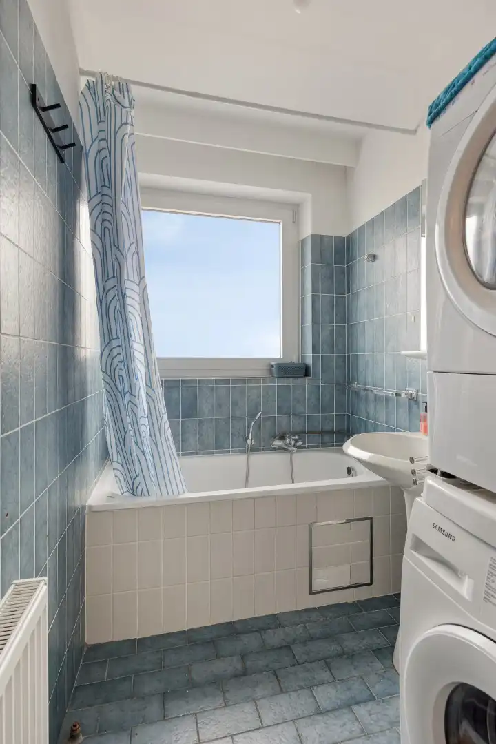 Verzorgd appartement met lift, 2 slaapkamers, garage en kelder foto 17