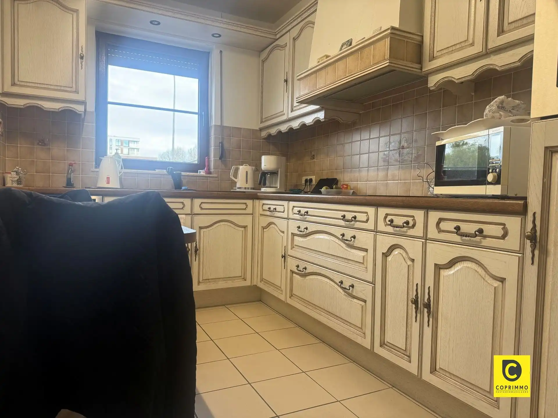 Gelijkvloers app. 3 slk, tuin en P foto 3