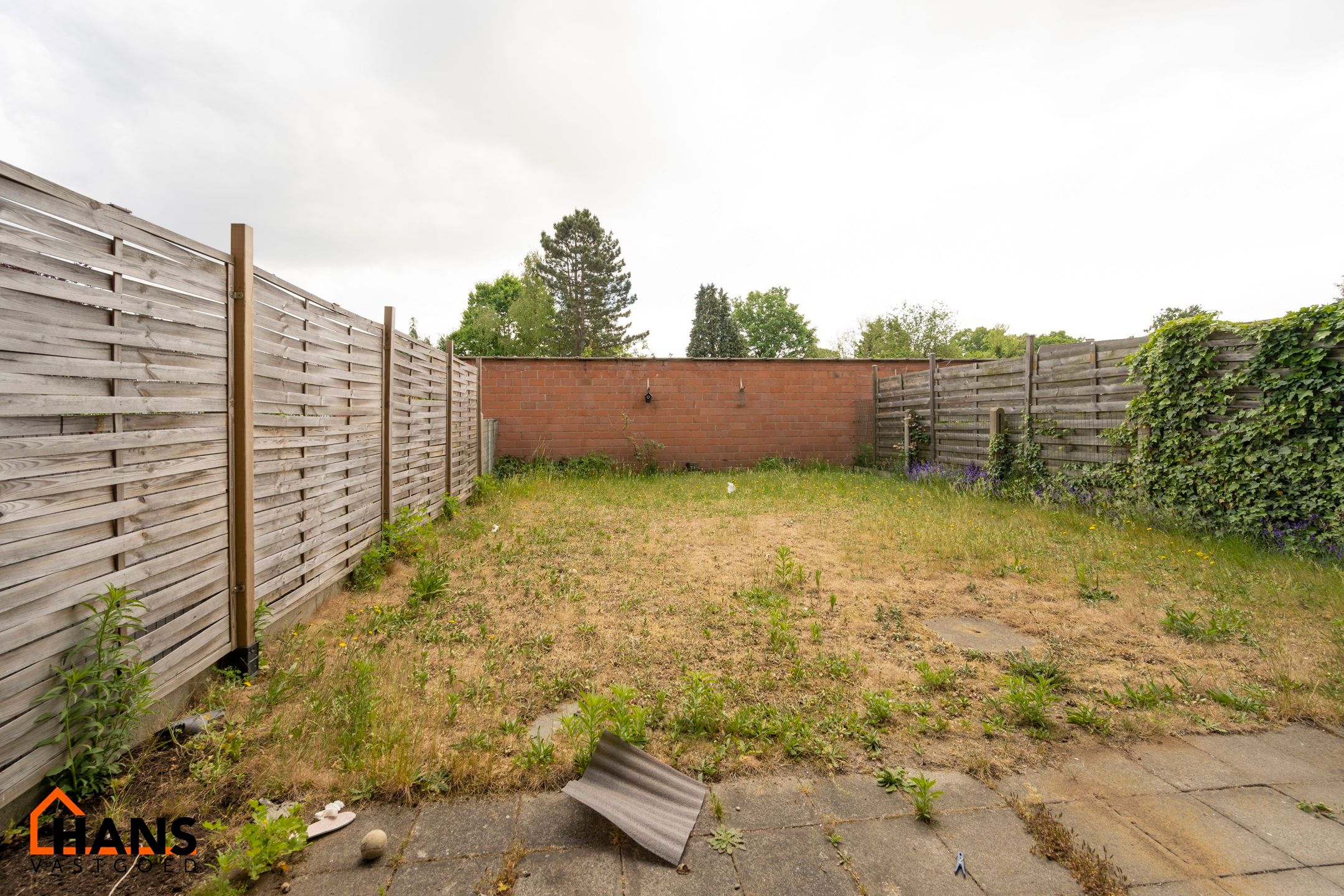 Opgefrist appartement met tuin en garage foto 12