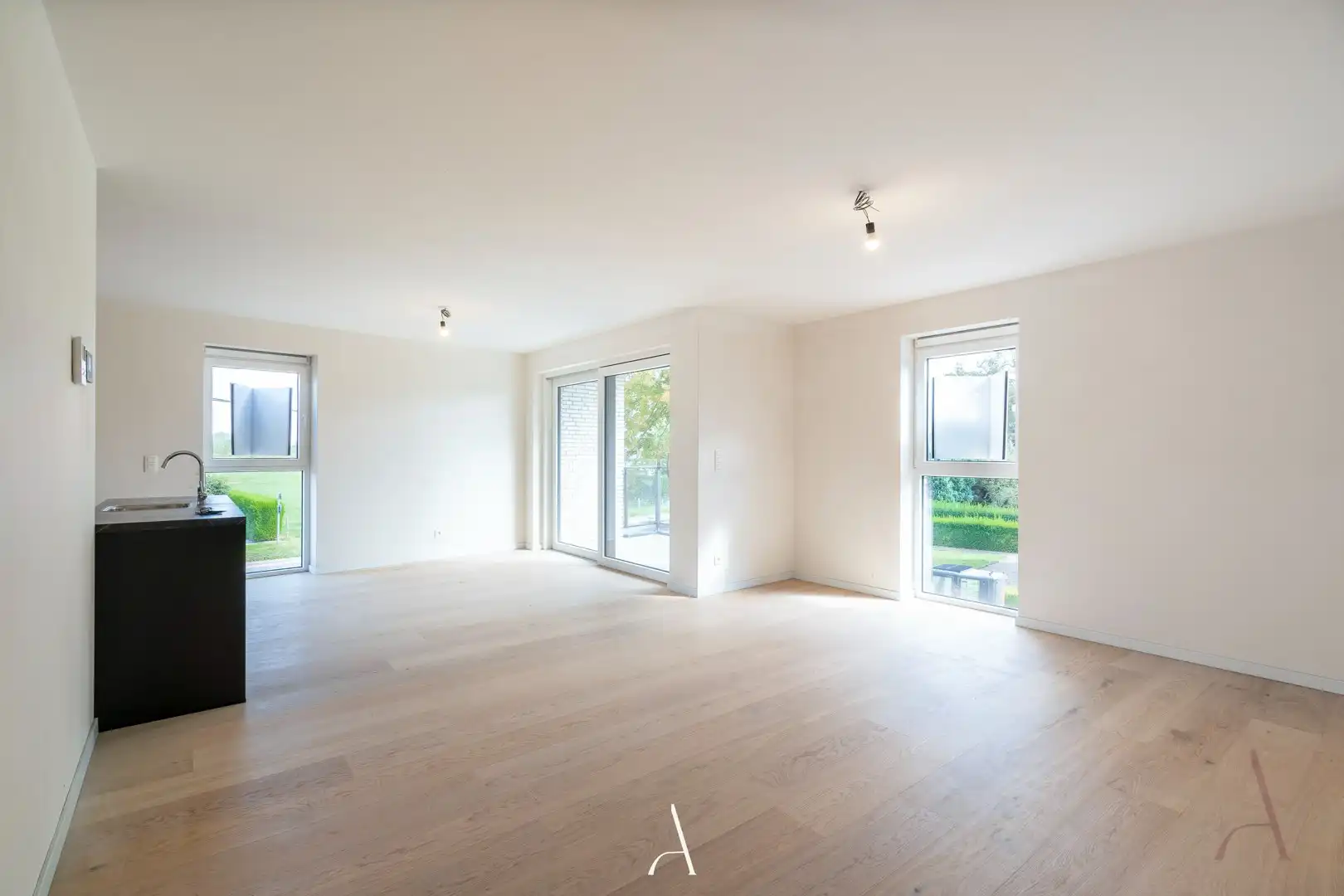 Te huur - Recent en energiezuinig 2-slaapkamerappartement met ondergrondse autostandplaats foto 3