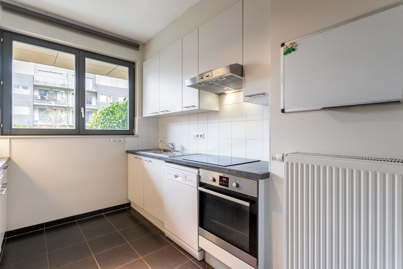 Energiezuinig 1-slpk appartement gelijkvloers met terras, parking en toplocatie nabij Brussel-Zuid foto 11