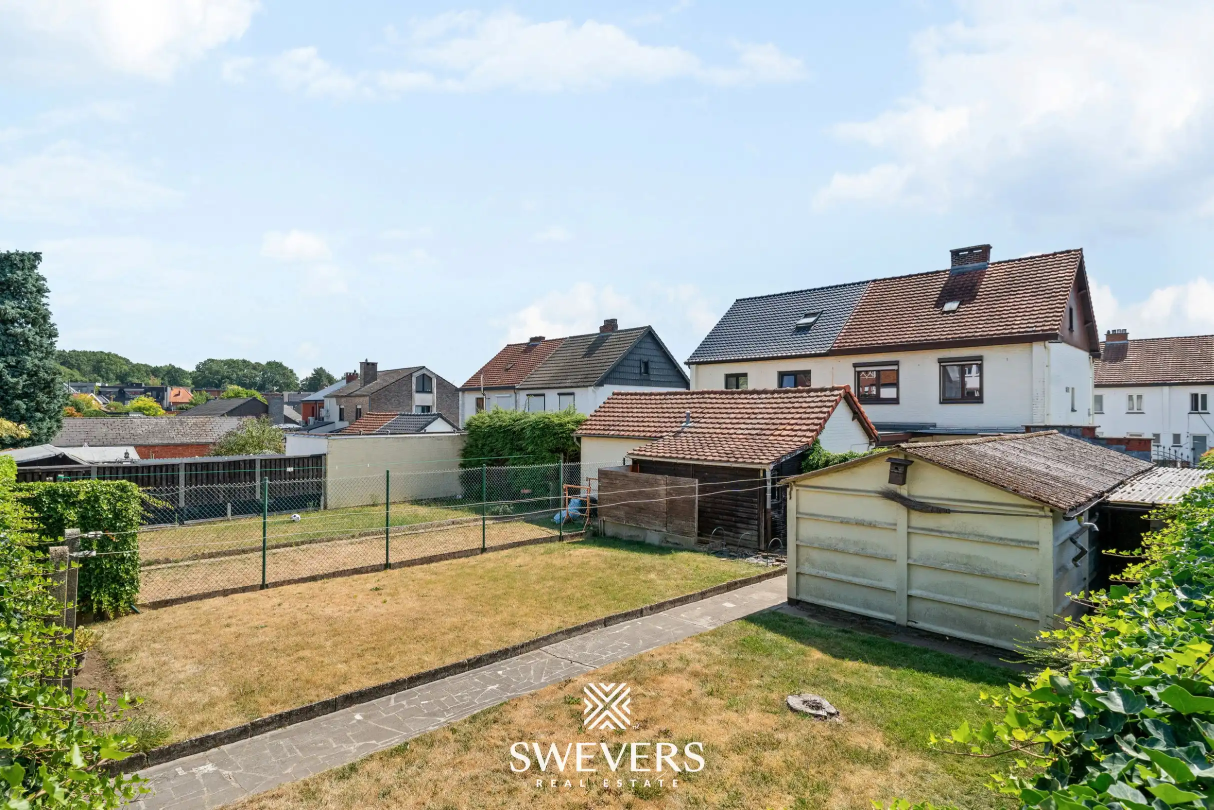 Uitstekend gelegen woning met 4 slaapkamers en mooie tuin foto 29