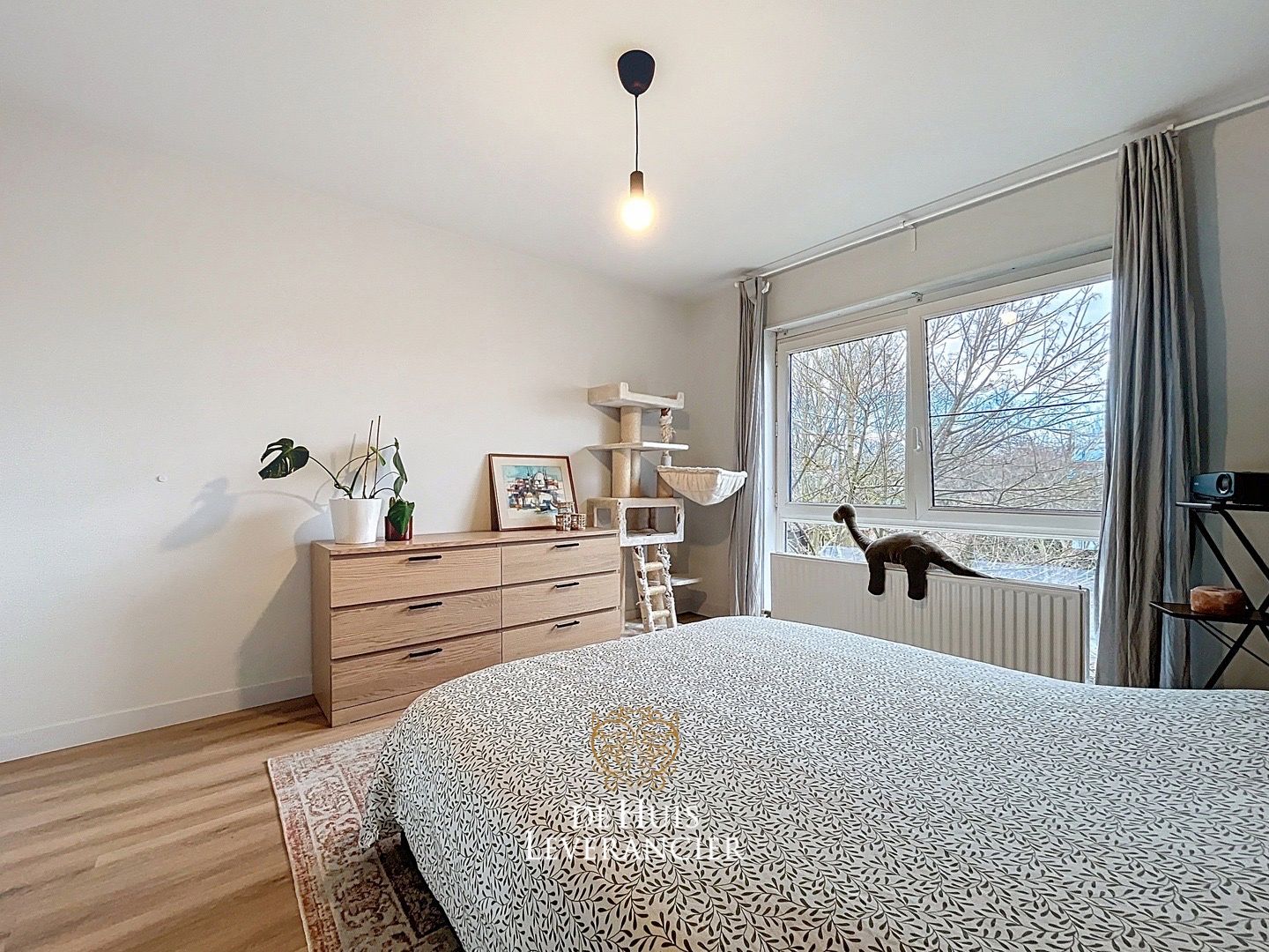 Gerenoveerd appartement met 2 slaapkamers, garagebox en berging te koop in Edegem foto 15