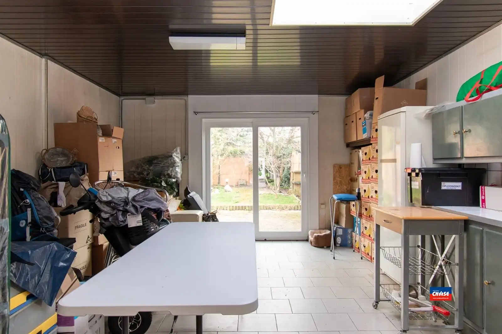 Magazijn / atelier met woonst en tuin foto 5