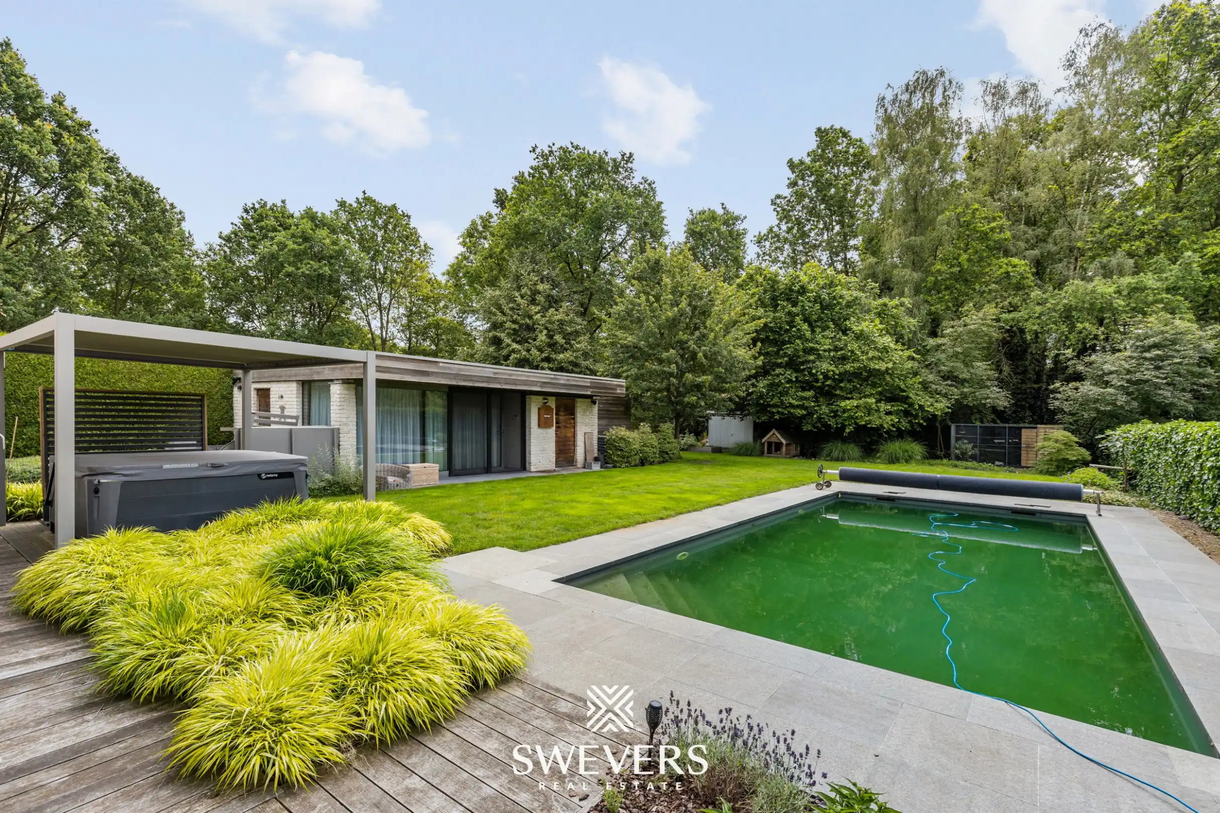 Villa met luxueus poolhouse, verwarmd zwembad en absolute topligging in Zonhoven foto 3