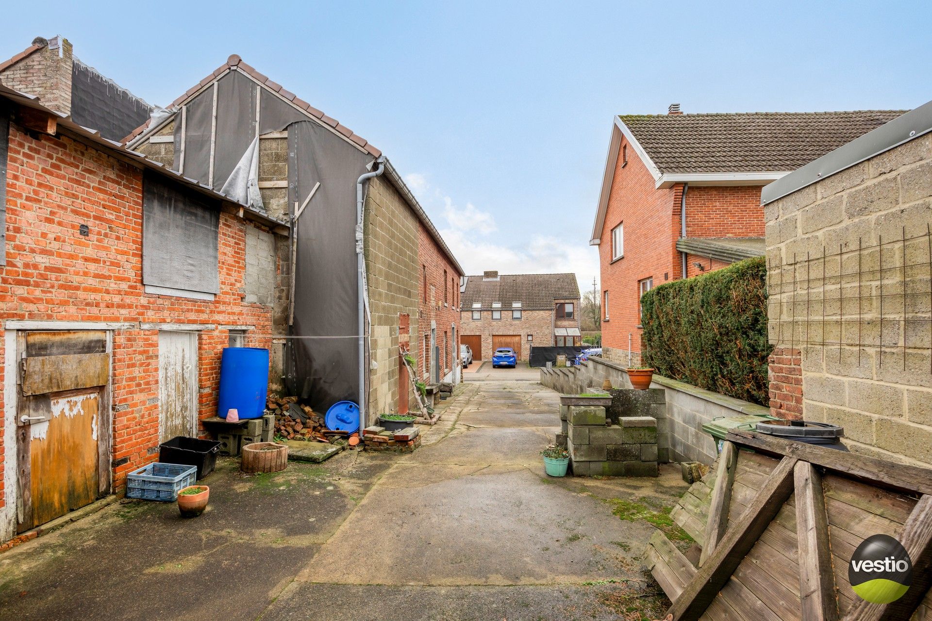 Te renoveren woning met bijgebouwen in het rustige centrum van Bevingen (Sint-Truiden) foto 5