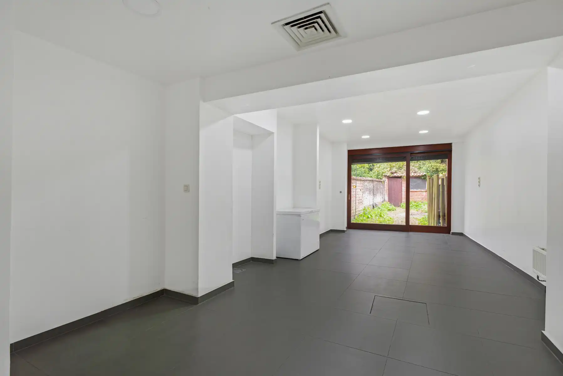 Uniek handelspand mét gerenoveerde woonst in het hart van Boom foto 17