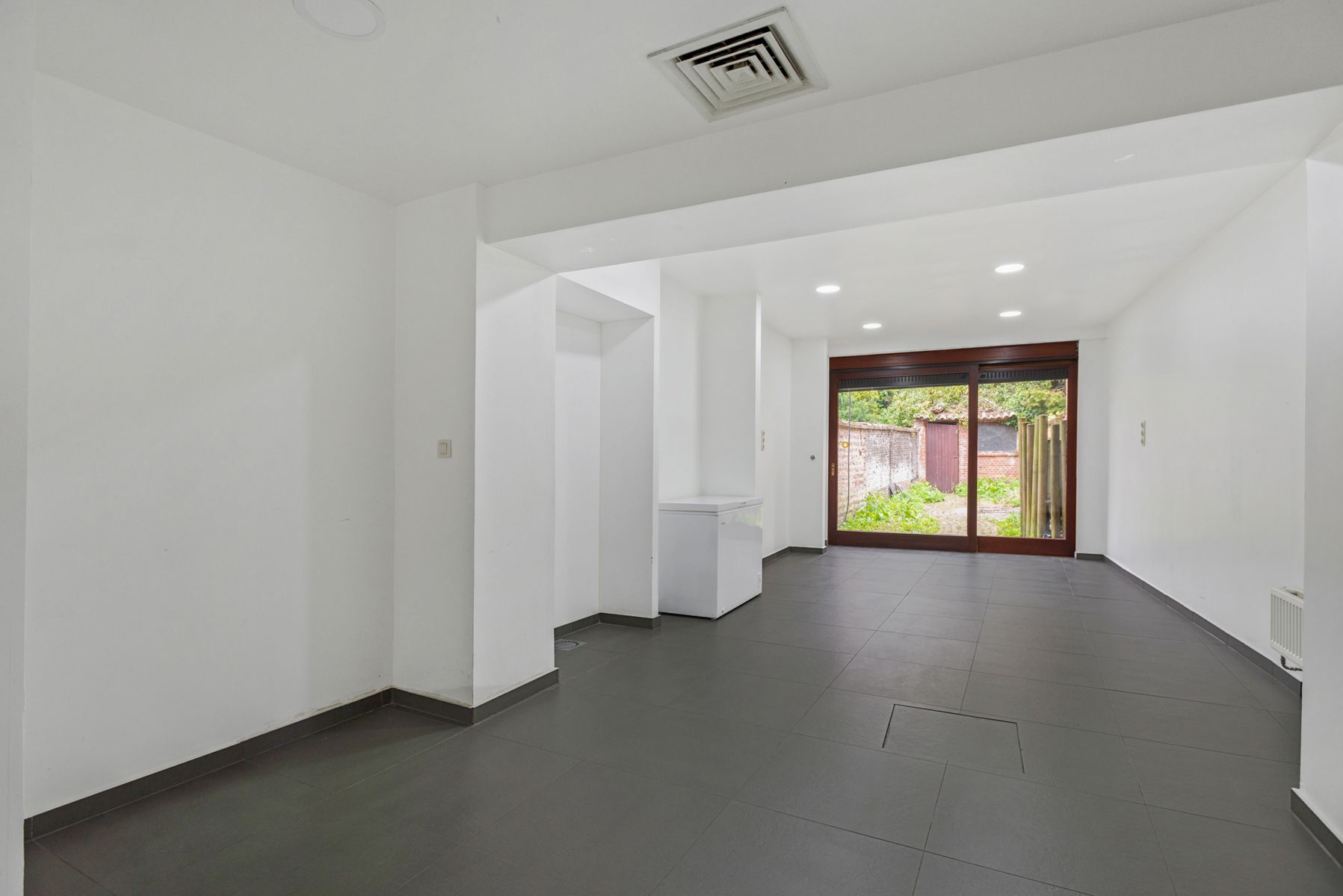 Uniek handelspand mét gerenoveerde woonst in het hart van Boom foto 17