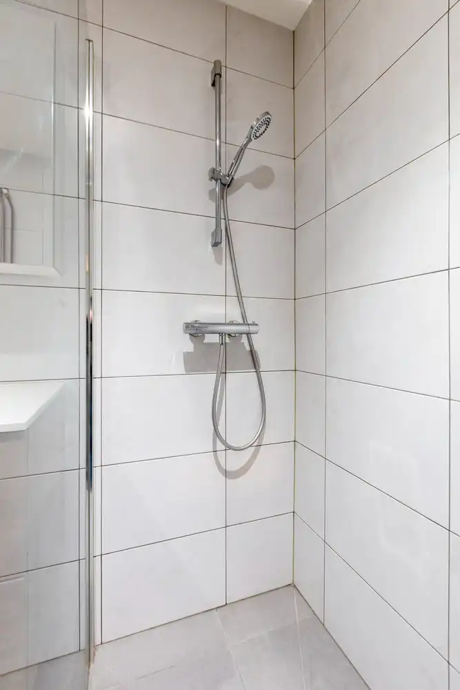 Te renoveren rijwoning met veel potentieel in hartje Genk foto 9