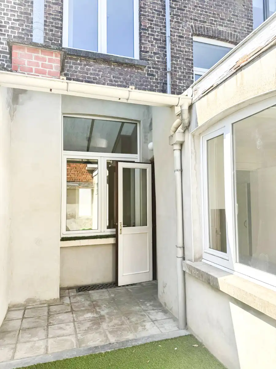 Praktische rijwoning met 3 ruime slaapkamers op zeer gunstige ligging! foto 9